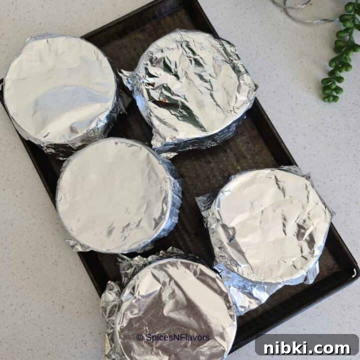 2-Ingredient Baked Yogurt Recipe: Creamy Oven Yogurt 6 prepping the ramekins to be chilled in the refrigerator