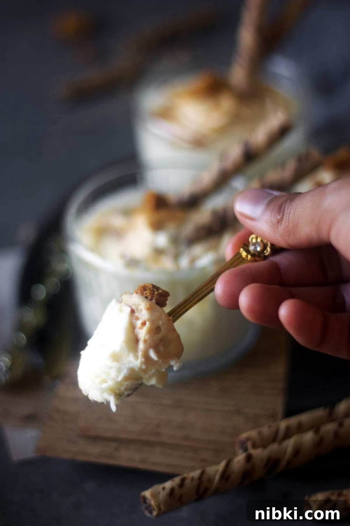 2-Ingredient Baked Yogurt Recipe: Creamy Oven Yogurt 7 baked yogurt being scooped out using a spoon