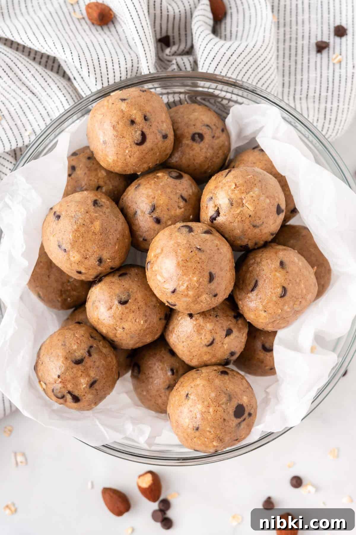almond butter protein balls stacked in a bowl