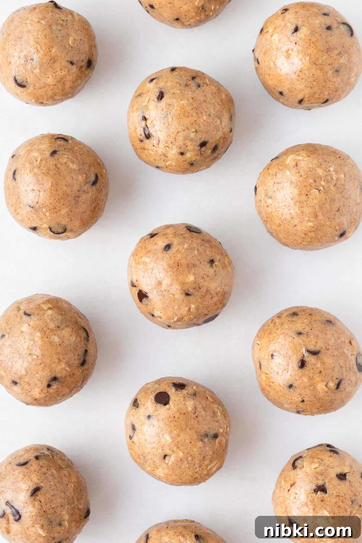 almond butter energy balls on a baking sheet