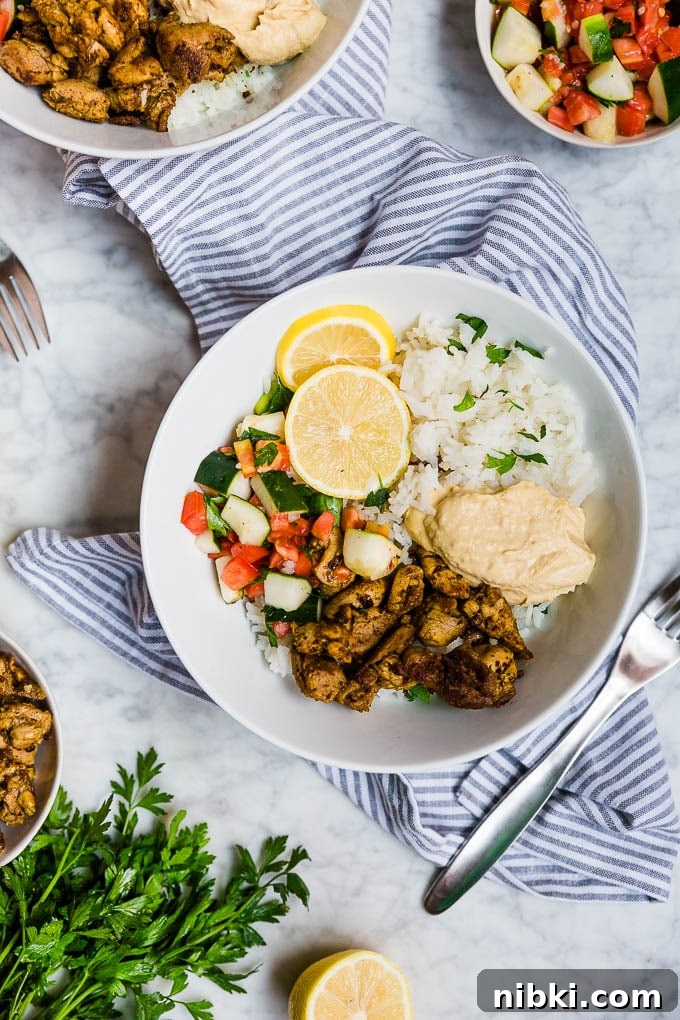 Mediterranean Chicken Bowls with Tzatziki and Quinoa 2 Easy meal prep mediterranean chicken bowls with rice, hummus and tomato cucumber salad.