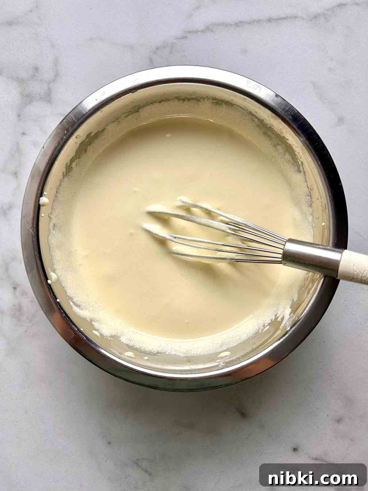 How to Make Classic Homemade Eggnog with Rum 4 eggs whisked until light and fluffy.