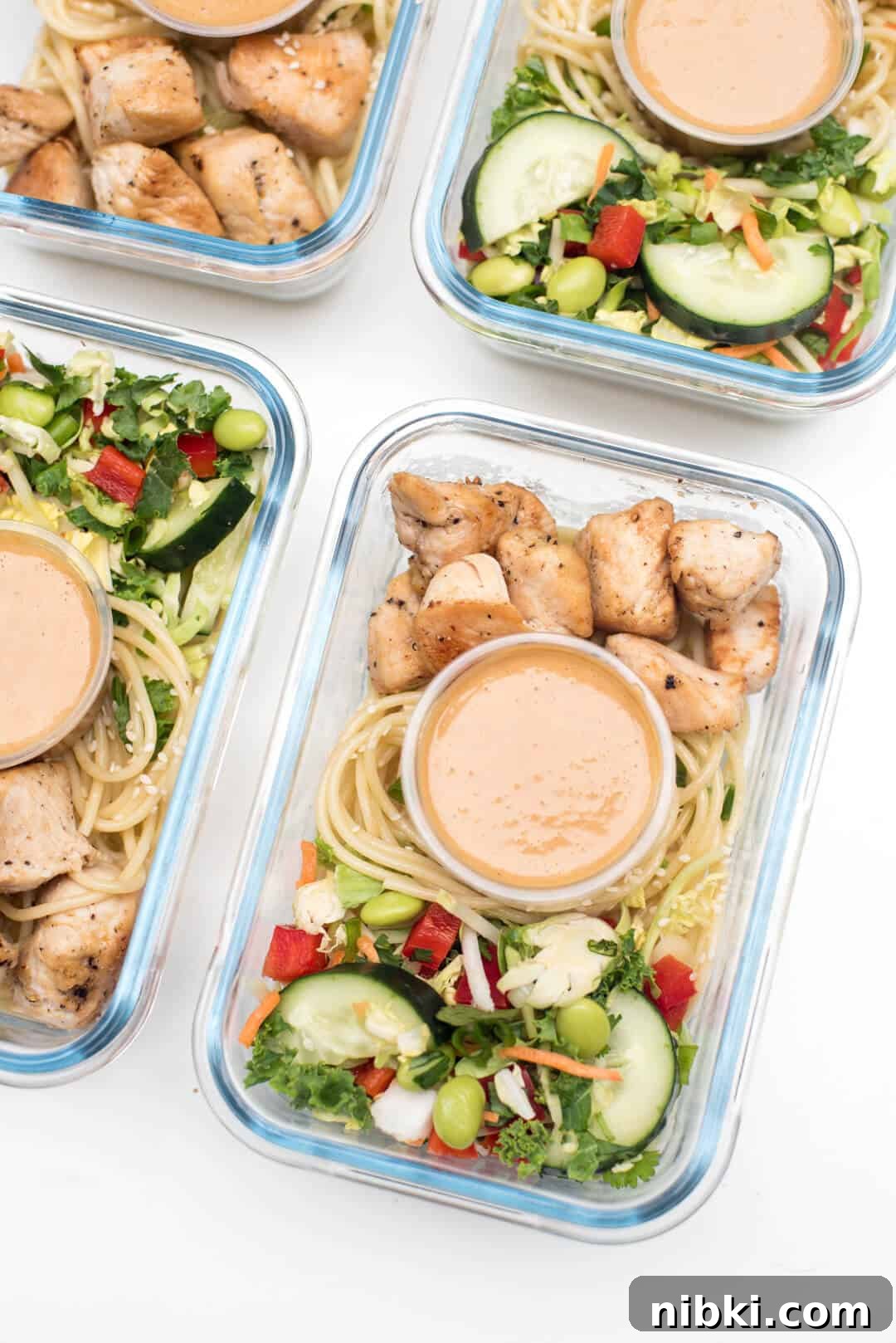 Four Thai Peanut Chicken Meal Prep Bowls.