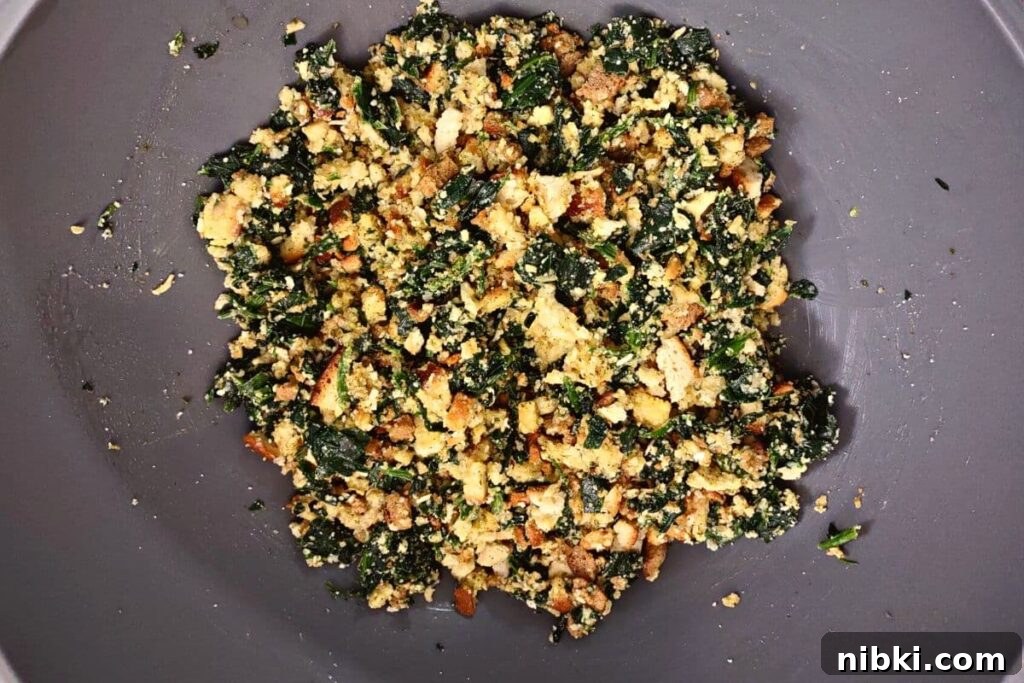 Air Fryer Spinach Balls: Crispy Appetizer Recipe 6 cooled spinach ball mixture in a gray bowl