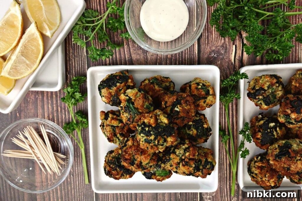 Air Fryer Spinach Balls: Crispy Appetizer Recipe 9 overhead view of air fried spinach balls on two sets of square plates