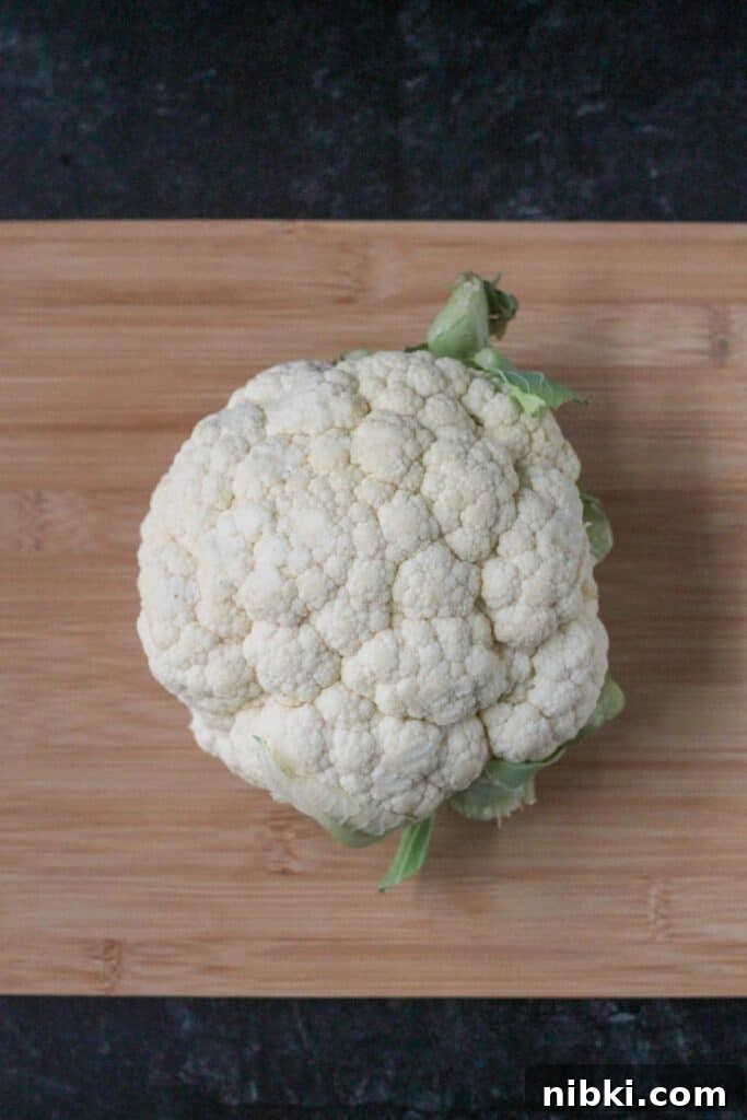 How to Make Crispy Vegan Roasted Cauliflower Steaks 4 One whole raw cauliflower.