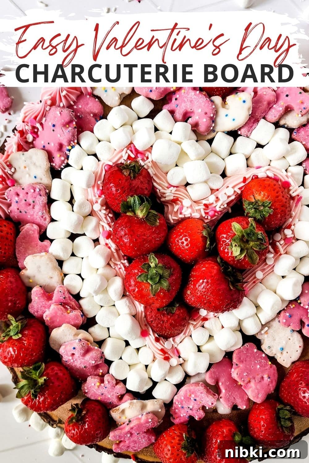 Valentine's Charcuterie Board Ideas for Date Night 2 close up shot of valentine charcuterie board with strawberries