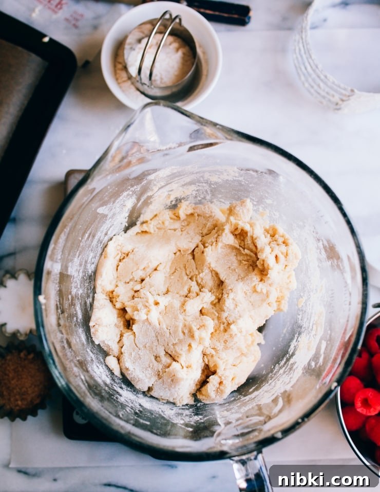 Flaky Homemade Raspberry Scones with Lemon Glaze 4 Scones dough | sophisticatedgourmet.com