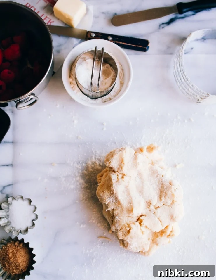 Flaky Homemade Raspberry Scones with Lemon Glaze 5 Scone dough
