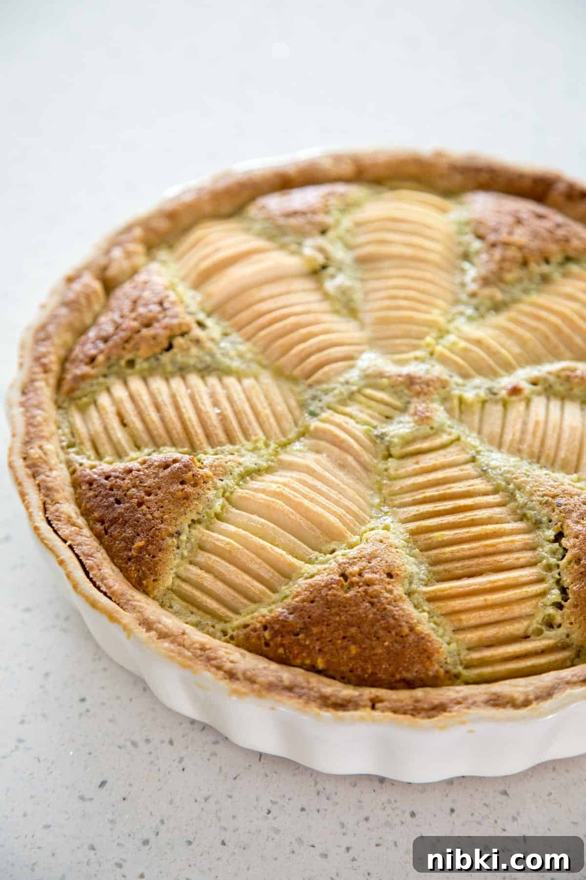 A baked frangipane pear tart.