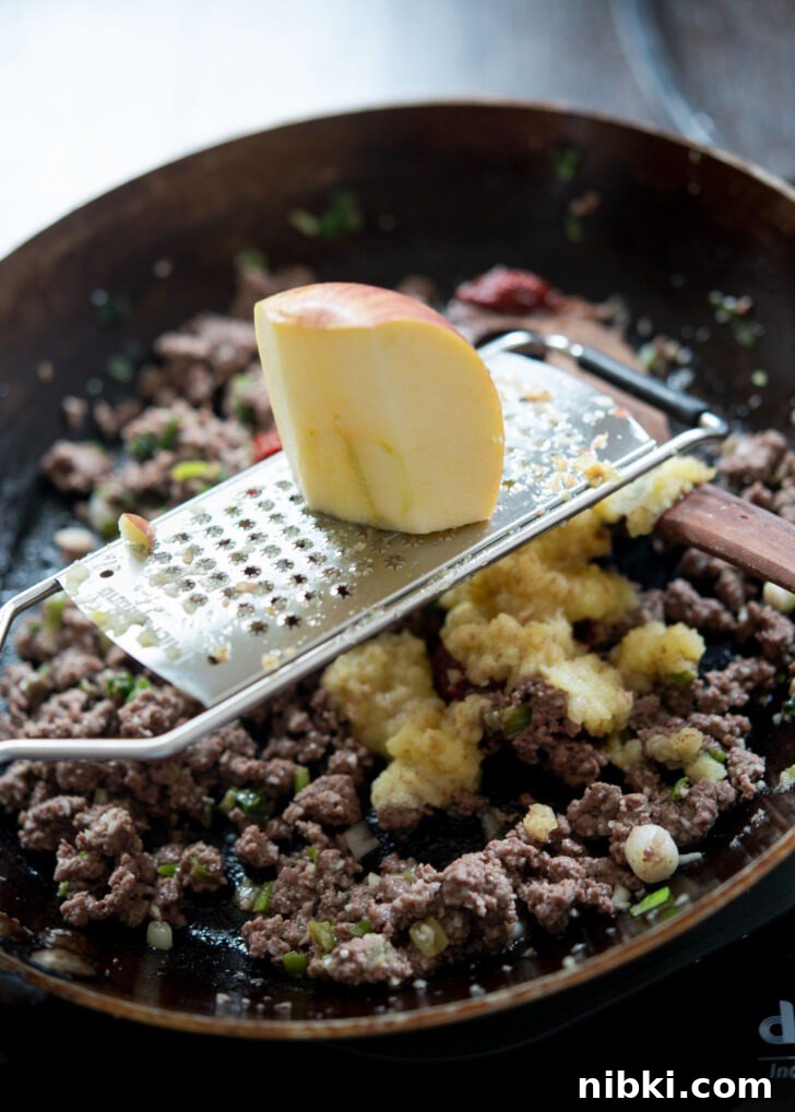 20-Minute Beef Noodles with Gochujang Sauce 8 Fresh apple is grated over beef mixture for making gochujang noodles