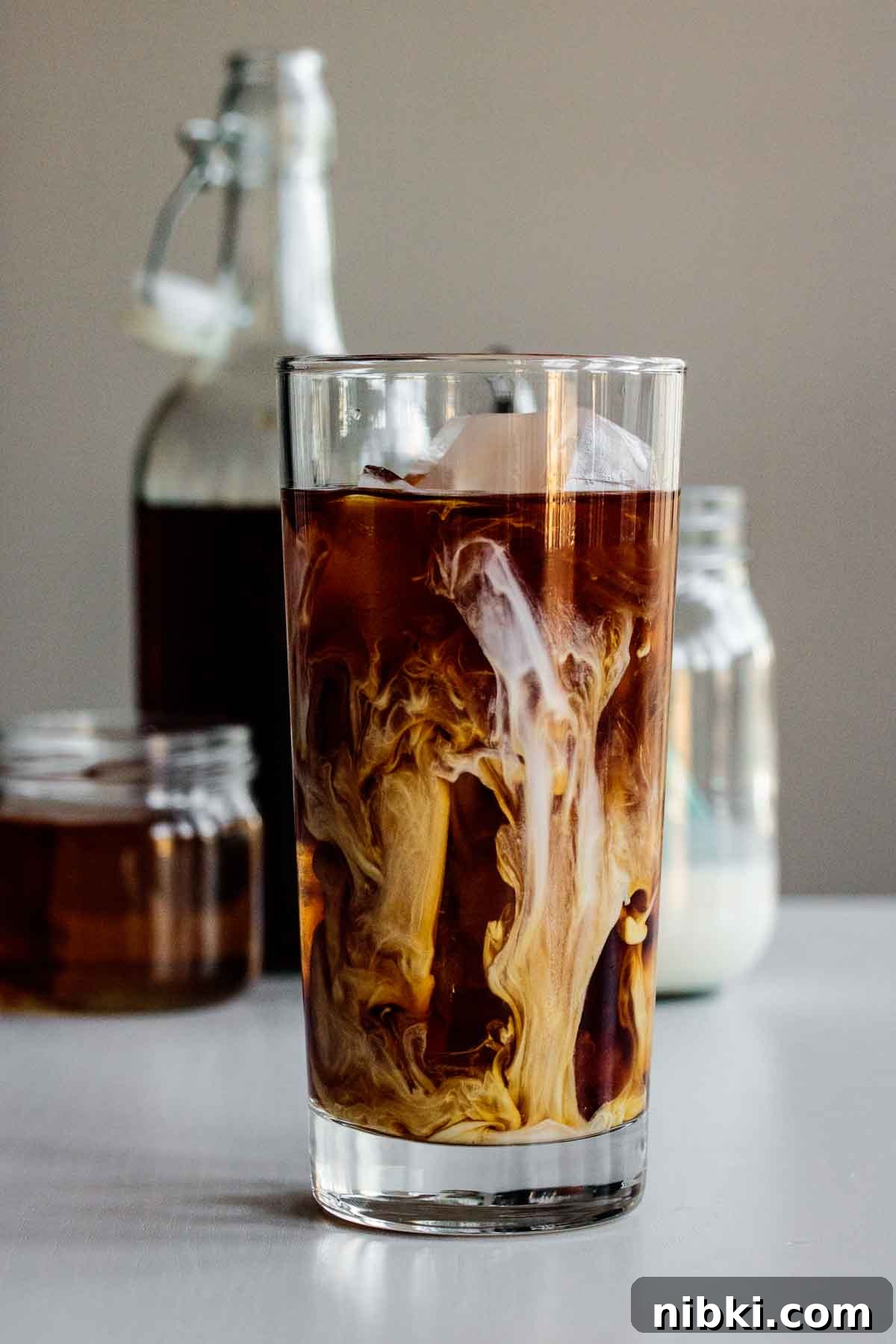 How to Make Starbucks Vanilla Sweet Cream Cold Brew at Home 2 a vanilla sweet cream cold brew just made, on tall glass over ice