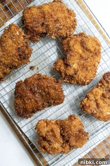 fried chicken dipped in hot honey sauce