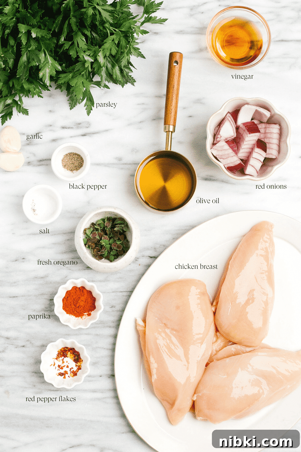 Juicy Grilled Chicken with Chimichurri Recipe 2 ingredients to make grilled chicken chimichurri recipe on a marble board