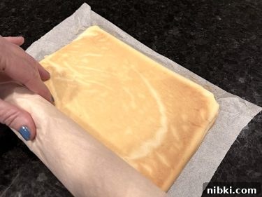 Flip sponge, and roll together with paper