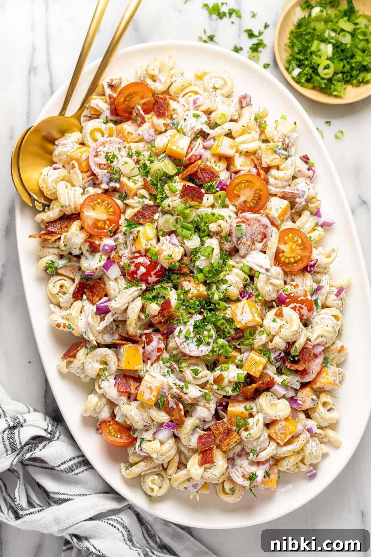Creamy Chicken Bacon Ranch Pasta Salad Recipe 2 Large oval platter filled with homemade chicken bacon ranch pasta salad.