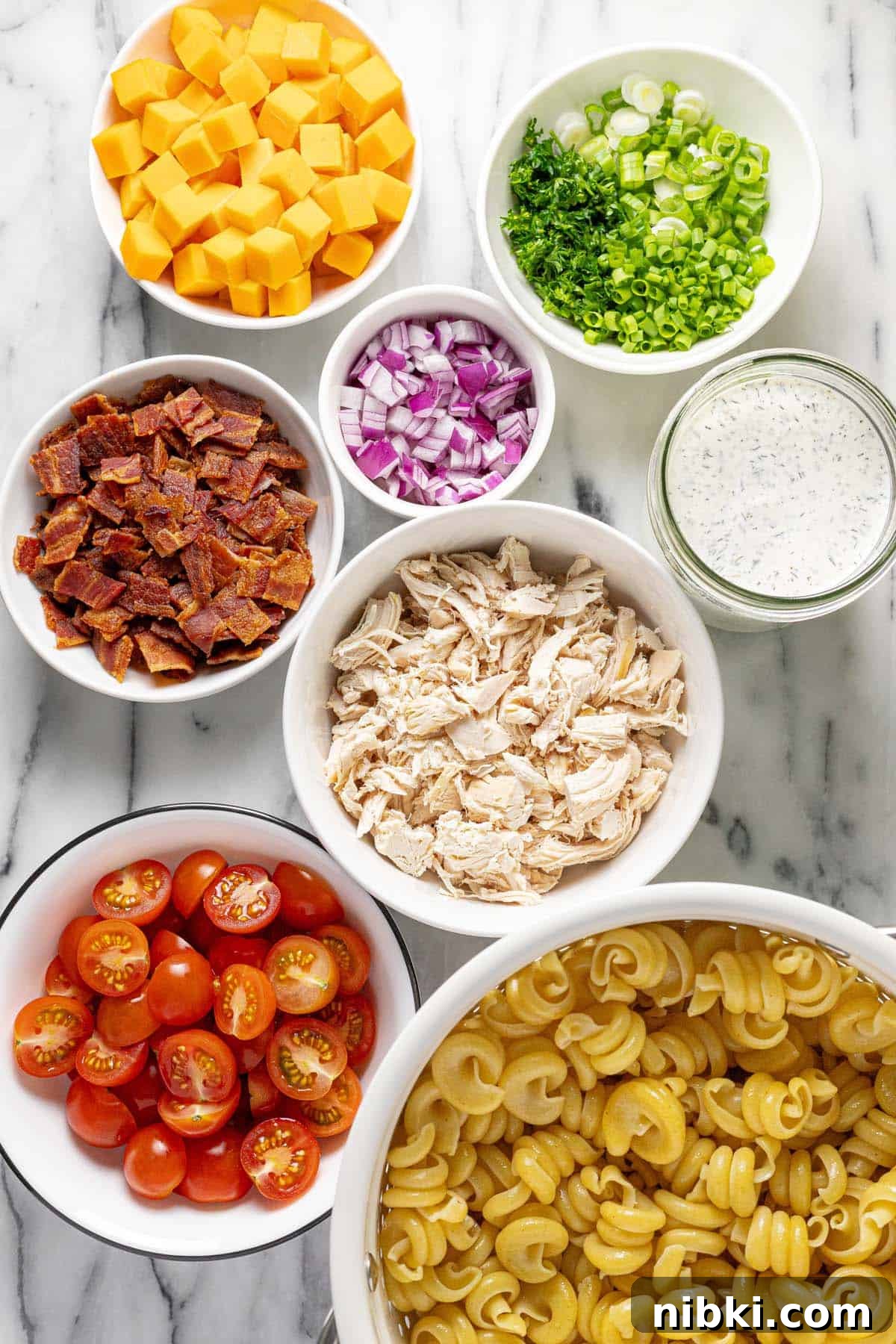 Creamy Chicken Bacon Ranch Pasta Salad Recipe 3 Bowls of ingredients to make chicken ranch pasta salad.