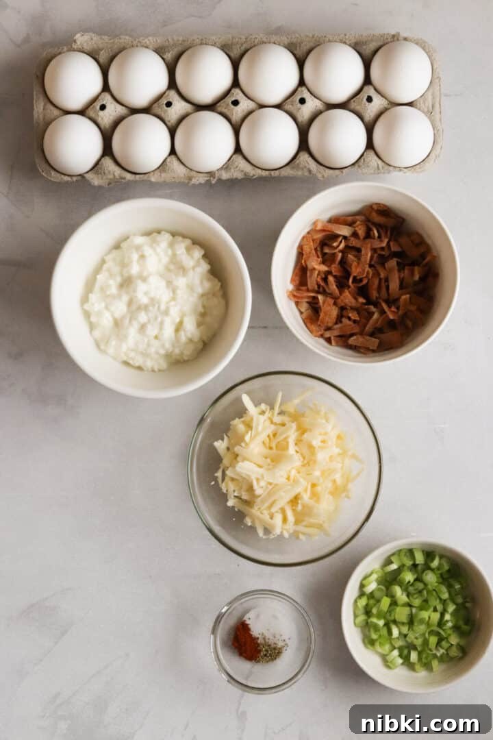 Savory Cottage Cheese Frittata Recipe 3 Ingredients for cottage cheese egg bake displayed in small bowls on a grey marble counter
