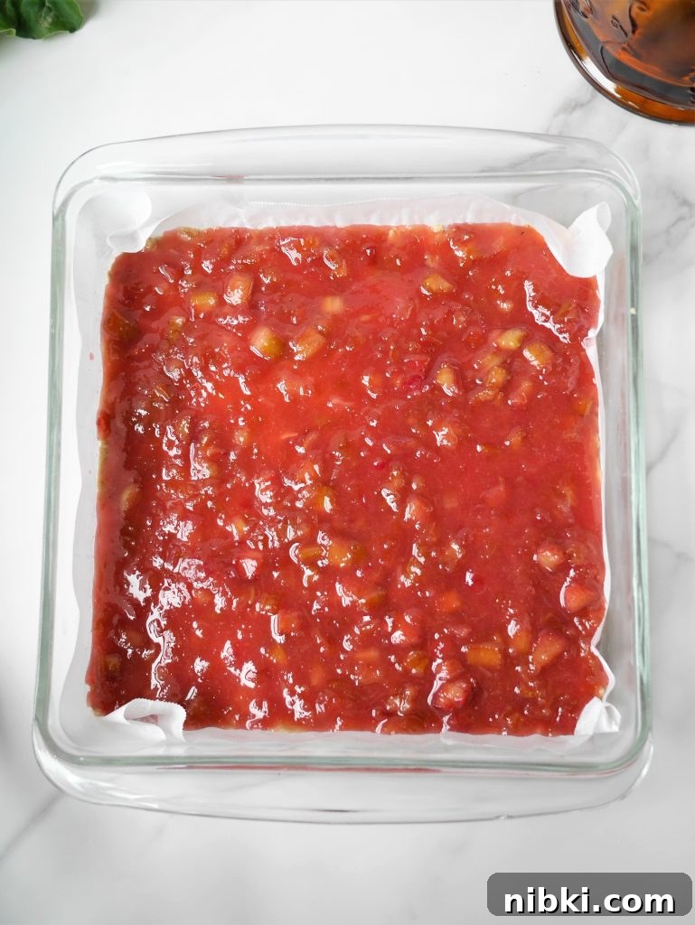 Amish Oatmeal Rhubarb Crumb Bars Recipe 6 Pressing crumb base into pan