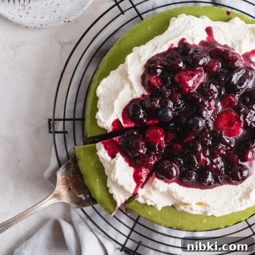 close up of cheesecake being sliced