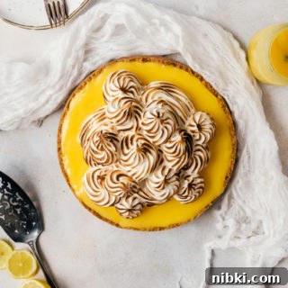 Tangy Lemon Meringue Cheesecake Recipe 9 A sweet and tangy lemon meringue cheesecake that everyone will adore
