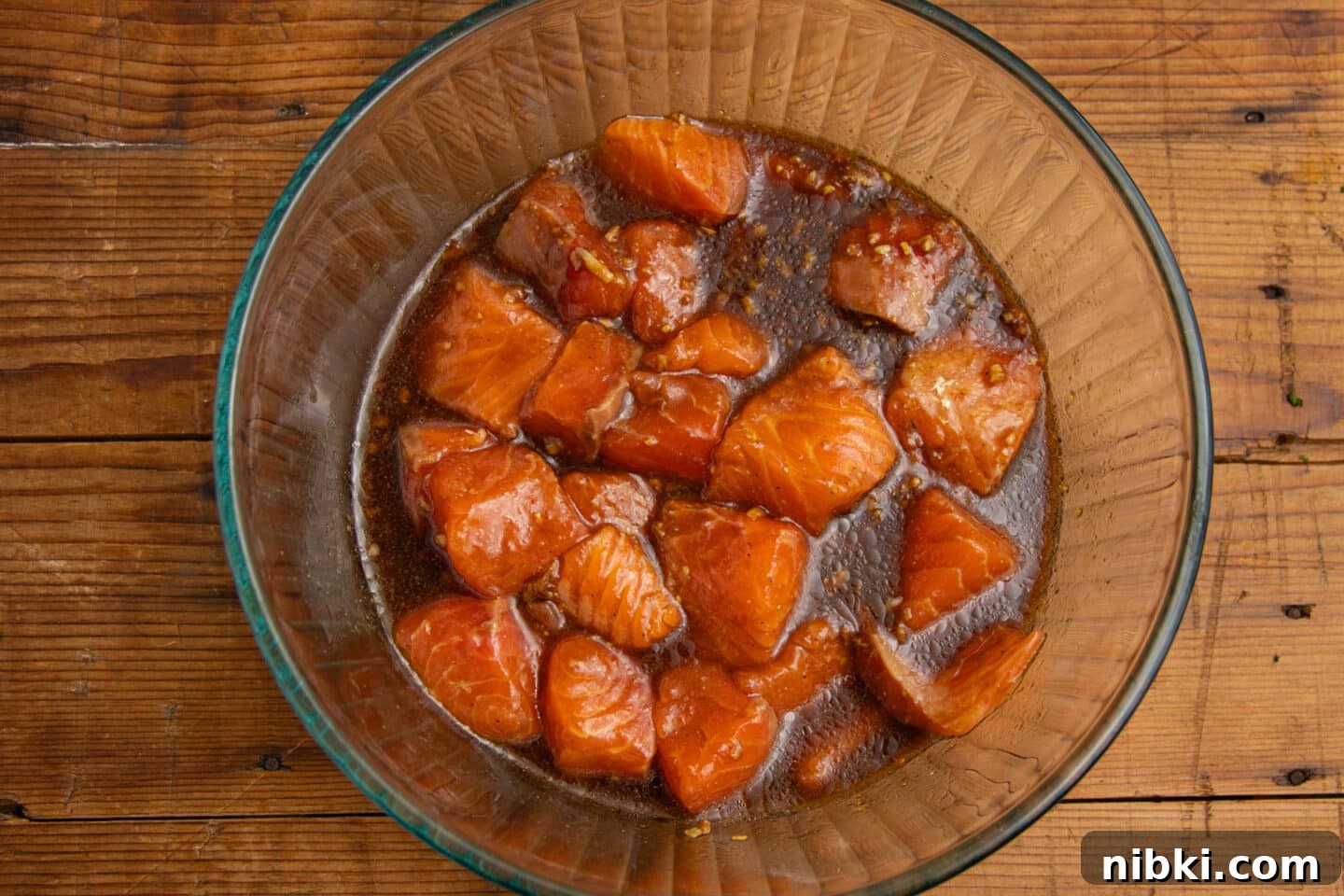 Hot Honey Garlic Salmon Bites Recipe 6 This is a bowl of the salmon marinating in the sauce.