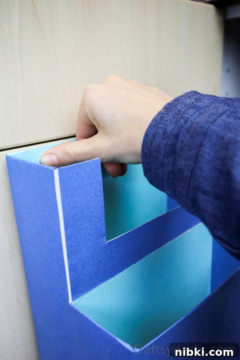 DIY Kitchen Cabinet Organizer to Maximize Storage 9 attaching organizer to cabinet