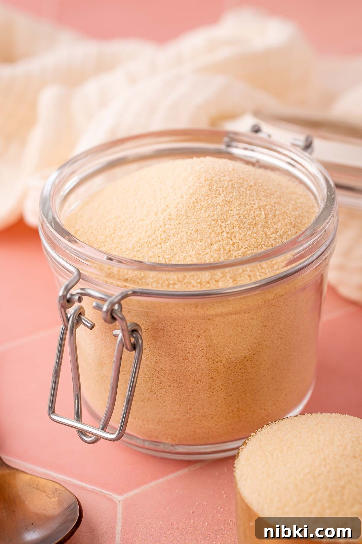 How to Make Toasted Sugar for Baking and Dessert Toppings 6 Toasted sugar in a glass canister.