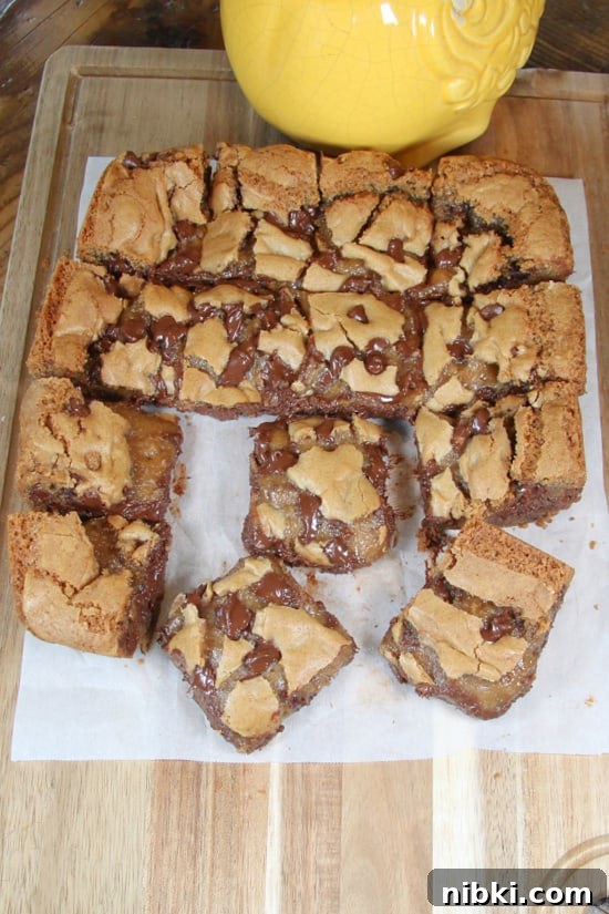 Chocolate Chip Cookie Bars are a chocolate lovers dream. Dessert squares that are chocolaty rich, chewy, and delicious.