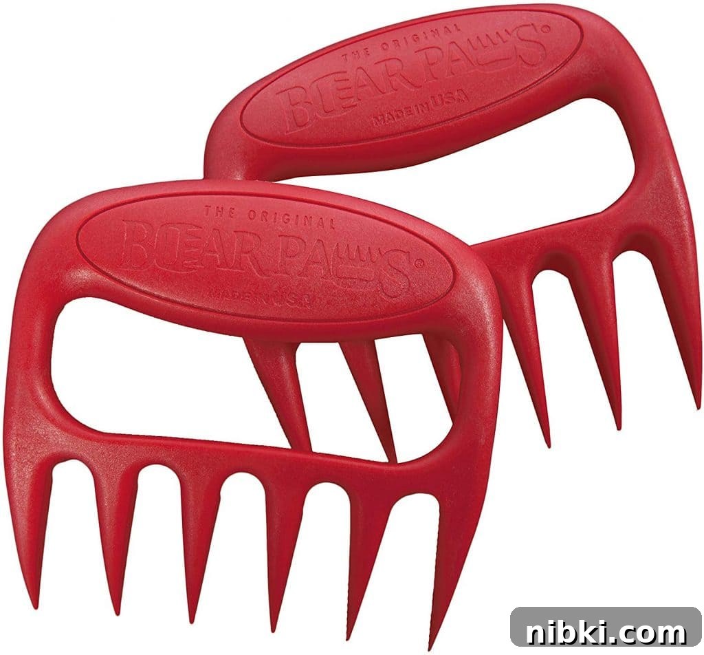 8 Small Kitchen Accessories That Save Space on Amazon 6 Bear claws shredding pulled pork on a cutting board