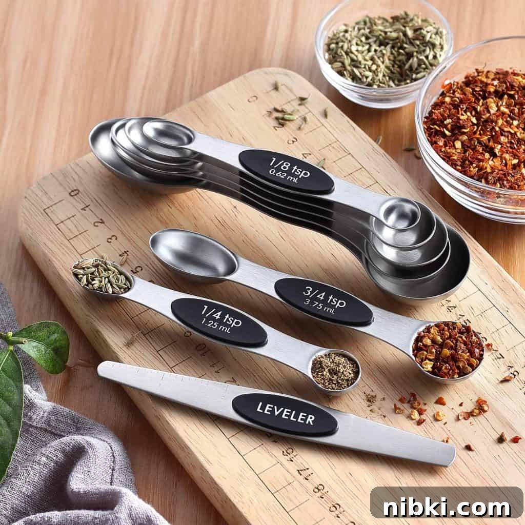 8 Small Kitchen Accessories That Save Space on Amazon 8 Magnetic measuring spoons neatly stacked together