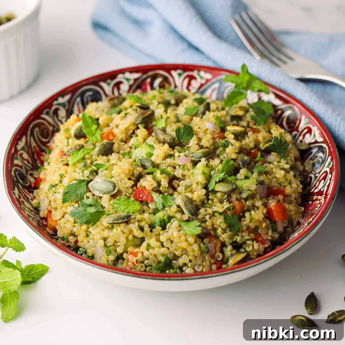 Pinterest graphic showing Herby Quinoa Salad Recipe