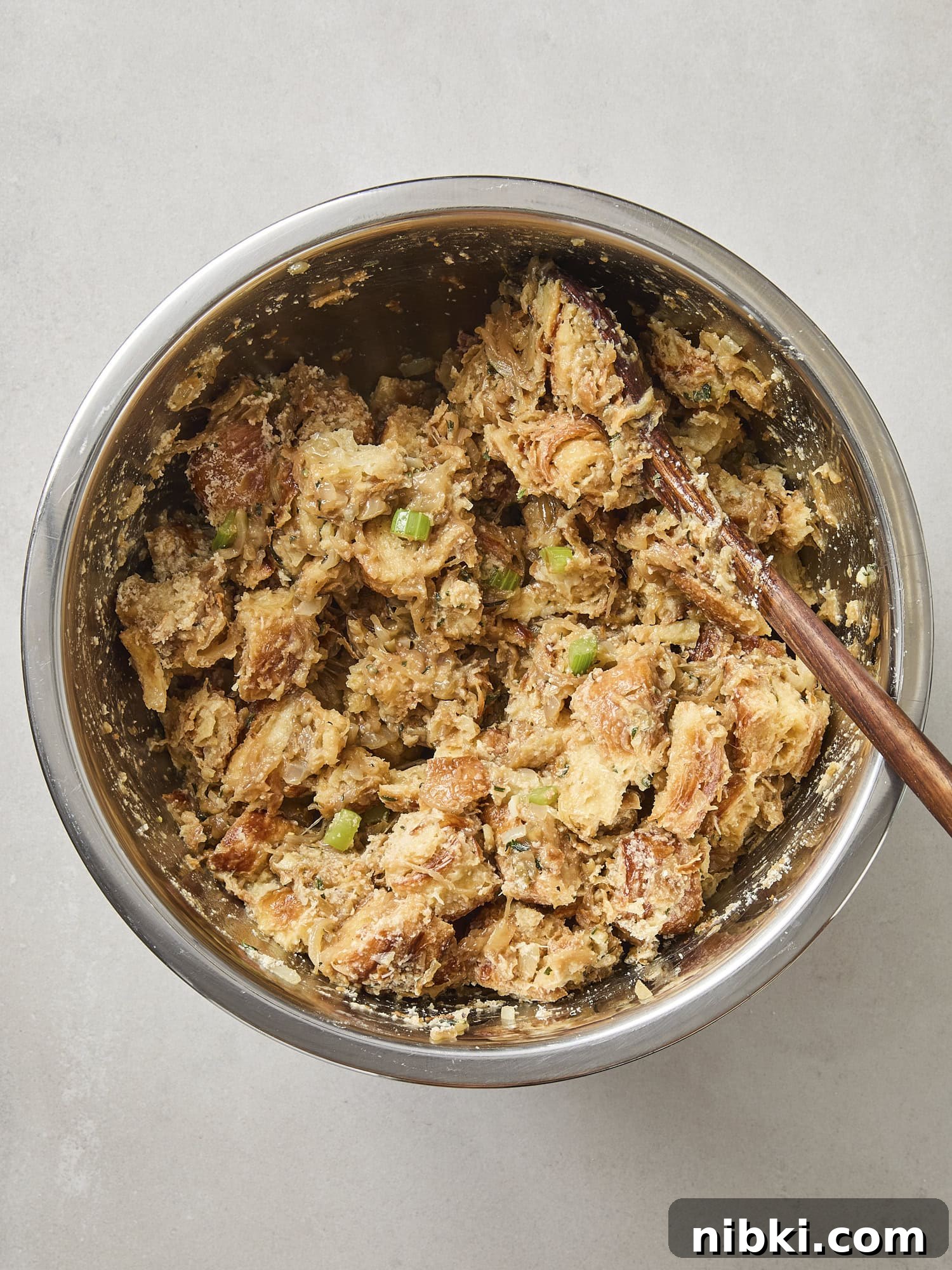 Caramelized Onion and Croissant Stuffing Recipe 11 Mixture of caramelized onions with croissant for stuffing.