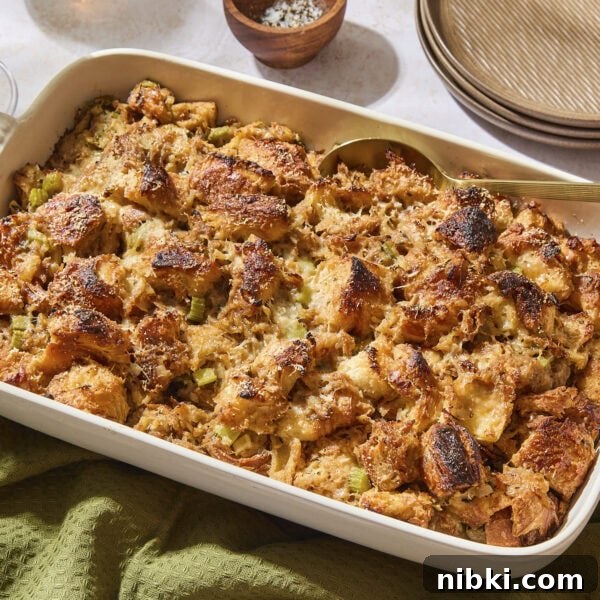 Caramelized Onion and Croissant Stuffing Recipe 15 Baked croissant stuffing in a white baking dish ready for the holidays.