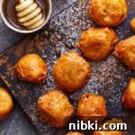 Crispy Fried Banana Fritters Recipe with Cinnamon Sugar 9 Fried bananas drizzled with honey.