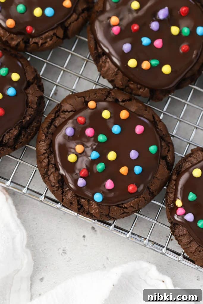 Gluten-free cosmic brownie cookies with chocolate ganache and rainbow bit sprinkles