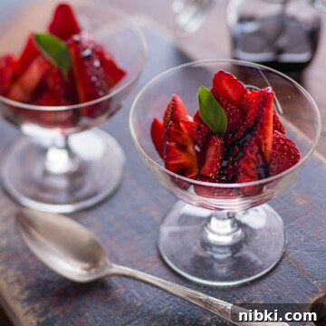 Gluten-Free Strawberry Shortcake Cake Recipe 13 Strawberries with Balsamic syrup in stemmed glasses for dessert.